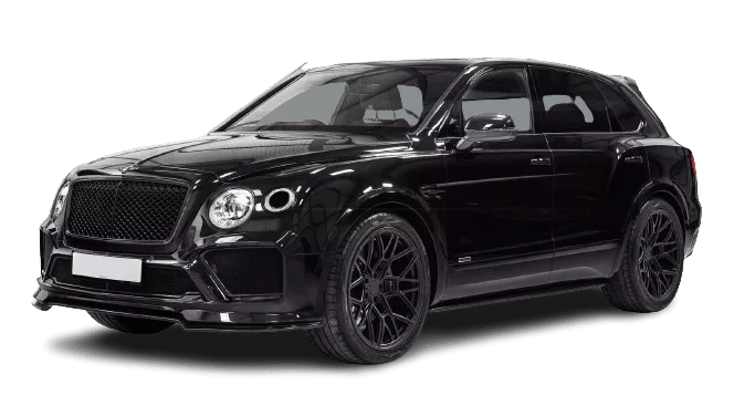 Black luxury suv on a black background, featuring a distinctive grille and sporty alloy wheels.